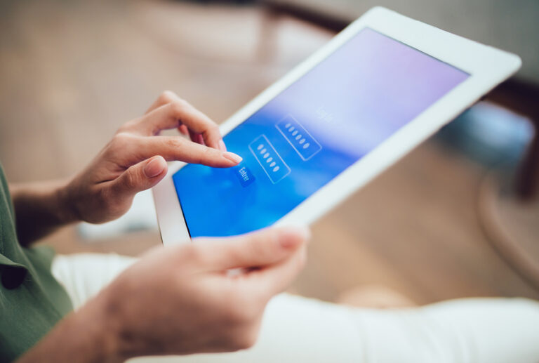 Woman using a tablet.
