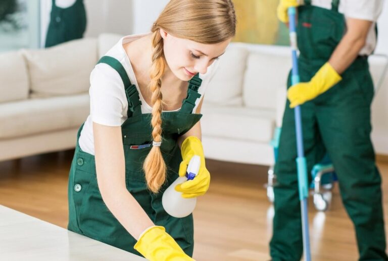 Women and man cleaning someone's home